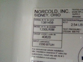 USED RV MOTORHOME REFRIGERATOR FOR SALE | NORCOLD 1200LRIM (WOOD PANEL)